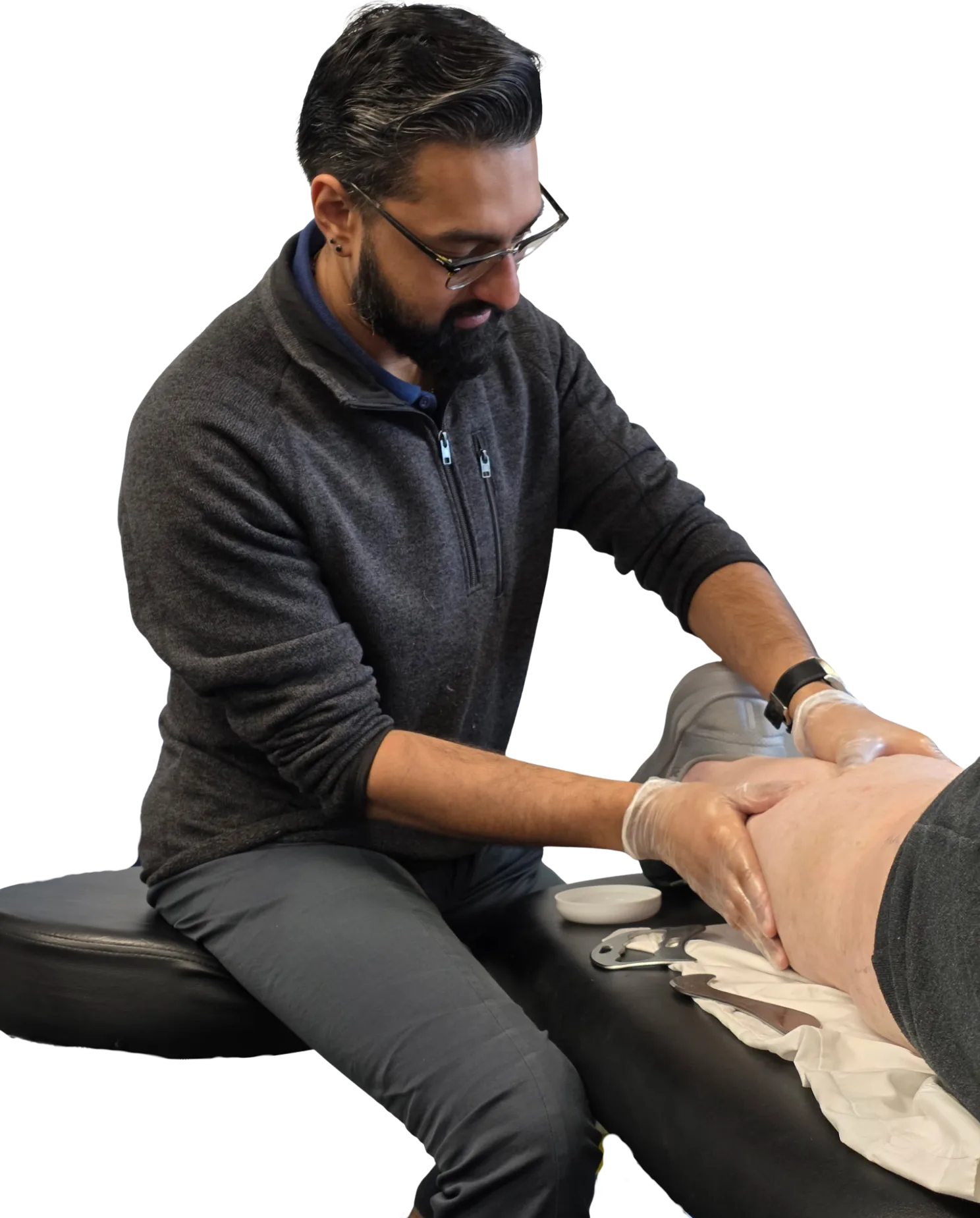 Dr Raj providing therapy treatment